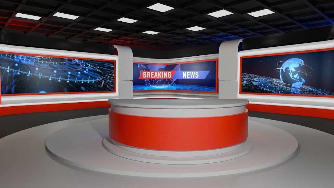 Broadcast newsroom with multiple screens and live feeds